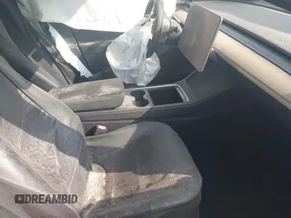 2023 Tesla Model 3 z VIN 5YJ3E1EAXPF639326, wystawiony jako IAAI lot #42132181 z przebiegiem 51 808 mil mil oraz . Historia ofert i sprzedaży dostępna na DreamBid. Obrazek 5.