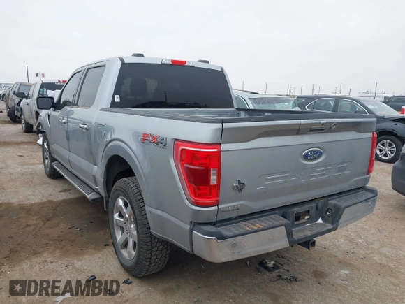 2023 Ford F-150 XL with VIN 1FTFW1E51PKF98102, listed as a IAAI auction lot 41594097 with 33,300 mi miles. Bid and sale history available at carsss.com. Image 3.