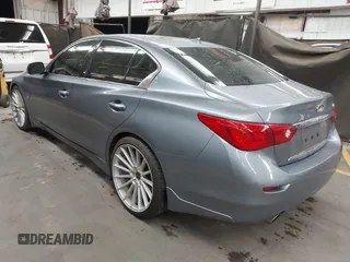 2015 Infiniti Q50 Premium z VIN JN1BV7AP6FM337369, wystawiony jako IAAI lot #41788419 z przebiegiem 106 977 mil mil oraz . Historia ofert i sprzedaży dostępna na DreamBid. Obrazek 3.