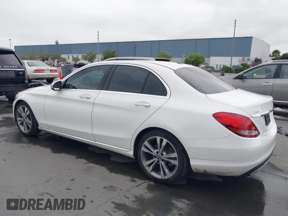 2018 Mercedes-Benz C 300 with VIN 55SWF4JB9JU235630, listed as a IAAI auction lot 42063801 with 117,855 mi miles and . Bid and sale history available at DreamBid. Image 3.