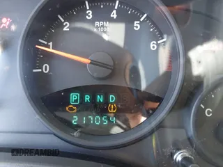 2010 Jeep Patriot Sport with VIN 1J4NT2GBXAD660180, listed as a IAAI auction lot 42146950 with 217,054 mi miles. Bid and sale history available at carsss.com. Image 7.