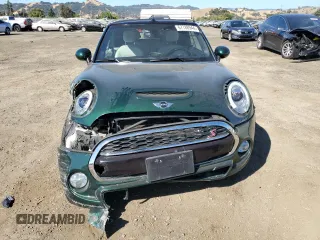 2017 MINI Convertible Cooper S with VIN WMWWG9C52H3C22857, listed as a Copart auction lot 67788944 with 56,987 mi miles and Salvage Title. Bid and sale history available at carsss.com. Image 5.