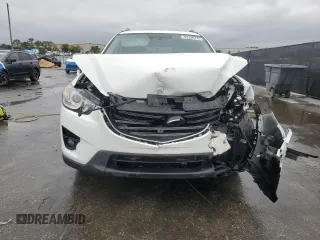 2016 Mazda CX-5 Grand Touring with VIN JM3KE2DYXG0839774, listed as a Copart auction lot 52336275 with 125,605 mi miles and Salvage Title. Bid and sale history available at carsss.com. Image 5.