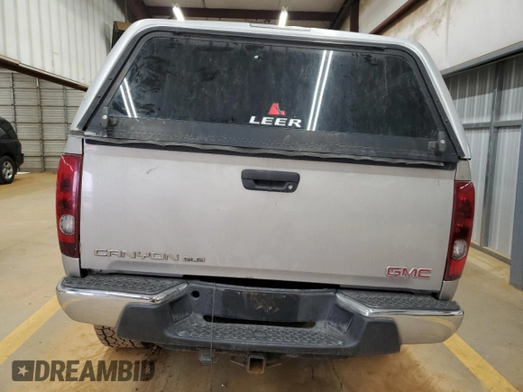 2005 GMC Canyon 1SF SLE Z71 with VIN 1GTDT136458193986, listed as a Copart auction lot 42023475 with 229,350 mi miles and Salvage Title. Bid and sale history available at carsss.com. Image 6.