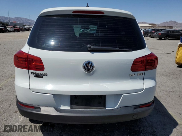 2014 Volkswagen Tiguan SE with VIN WVGAV3AX0EW614369, listed as a Copart auction lot 57664045 with 85,504 mi miles and Salvage title. Bid and sale history available at DreamBid. Image 6.