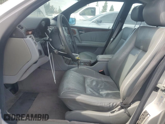 1998 Mercedes-Benz E with VIN WDBJF70F6WA643471, listed as a Copart auction lot 77189934 with 251,579 mi miles and Clean Title. Bid and sale history available at DreamBid. Image 7.