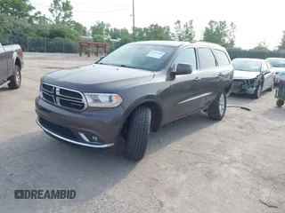 2015 Dodge Durango SXT with VIN 1C4RDJAG8FC939000, listed as a IAAI auction lot 42459660 with 108,101 mi miles and . Bid and sale history available at DreamBid. Image 2.
