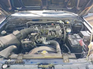 2002 Mitsubishi Montero ES z VIN JA4LS21H72J064812, wystawiony jako IAAI lot #42395976 z przebiegiem 131 436 mil mil oraz . Historia ofert i sprzedaży dostępna na DreamBid. Obrazek 10.