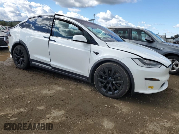 2022 Tesla Model X with VIN 7SAXCAE59NF358337, listed as a Copart auction lot 48262775 with Not Provided miles and Salvage Title. Bid and sale history available at DreamBid. Image 4.