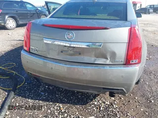 2011 Cadillac CTS Performance with VIN 1G6DK5ED6B0156490, listed as a IAAI auction lot 41346869 with 145,627 mi miles and . Bid and sale history available at DreamBid. Image 6.