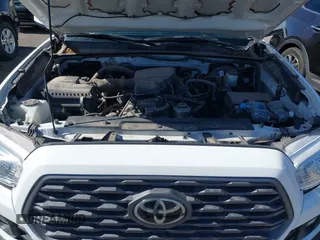2021 Toyota Tacoma SR with VIN 3TYAX5GN5MT014868, listed as a IAAI auction lot 41549927 with 30,653 mi miles and . Bid and sale history available at DreamBid. Image 10.