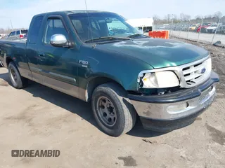 1999 Ford F-150 with VIN 1FTRX17W6XNB82190, listed as a IAAI auction lot 41597968 with 232,325 mi miles and . Bid and sale history available at DreamBid. Image 1.