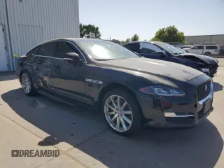 2016 Jaguar XJ R-Sport with VIN SAJWA1C70G8W02383, listed as a Copart auction lot 54580845 with 43,719 mi miles and Salvage Title. Bid and sale history available at DreamBid. Image 4.