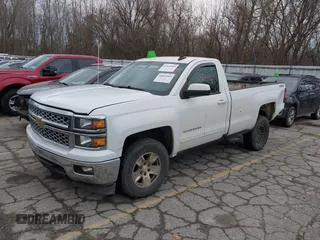 2015 Chevrolet Silverado 1500 LT with VIN 1GCNKRECXFZ414527, listed as a IAAI auction lot 41024683 with 219,673 mi miles. Bid and sale history available at carsss.com. Image 2.