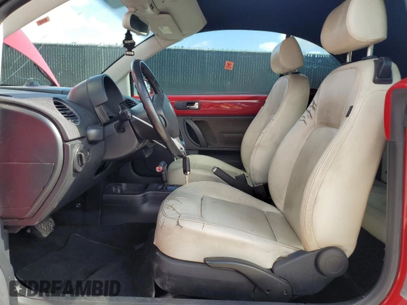 2010 Volkswagen Beetle Final Edition with VIN 3VWRW3AL6AM008857, listed as a Copart auction lot 64312235 with 104,318 mi miles and Salvage title. Bid and sale history available at DreamBid. Image 7.