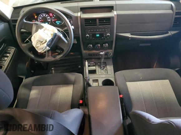 2010 Jeep Liberty Sport with VIN 1J4PN2GK2AW115064, listed as a Copart auction lot 57344645 with 114,275 mi miles and Salvage title. Bid and sale history available at DreamBid. Image 8.