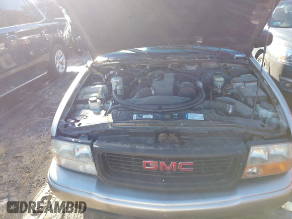 1998 GMC Sonoma SLS with VIN 1GTCS1948W8538832, listed as a IAAI auction lot 41536284 with 99,191 mi miles. Bid and sale history available at carsss.com. Image 10.