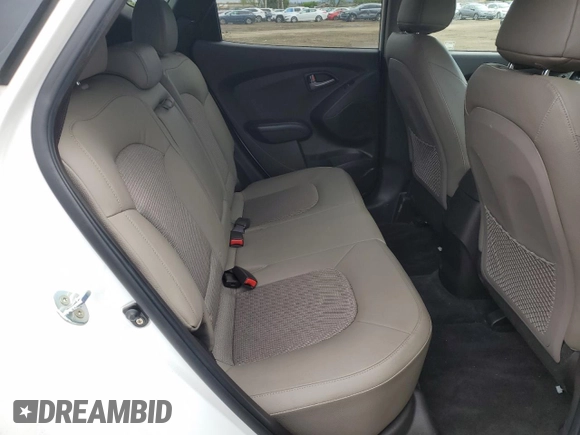 2015 Hyundai Tucson GLS with VIN KM8JT3AF0FU039863, listed as a Copart auction lot 51347815 with 104,469 mi miles and Salvage Title. Bid and sale history available at DreamBid. Image 11.