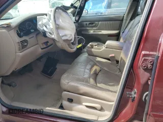 2002 Buick Century Limited with VIN 2G4WY55J421146194, listed as a Copart auction lot 71083644 with Not Provided miles and Salvage Title. Bid and sale history available at carsss.com. Image 7.