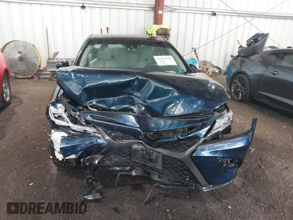 2018 Toyota Camry LE z VIN 4T1B11HK8JU517019, wystawiony jako IAAI lot #42220646 z przebiegiem 98 924 mil mil oraz . Historia ofert i sprzedaży dostępna na DreamBid. Obrazek 11.