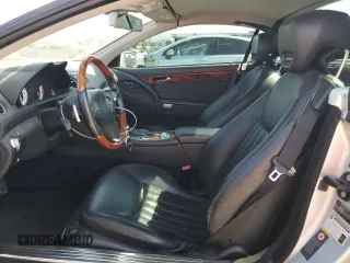 2009 Mercedes-Benz SL 550 z VIN WDBSK71F09F143733, wystawiony jako Copart lot #69045444 z przebiegiem 114 251 mil mil oraz Szkoda całkowita • Salvage title. Historia ofert i sprzedaży dostępna na DreamBid. Obrazek 7.