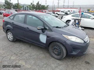 2013 Ford Fiesta SE with VIN 3FADP4BJ0DM199277, listed as a IAAI auction lot 42047833 with 142,739 mi miles. Bid and sale history available at carsss.com. Image 1.