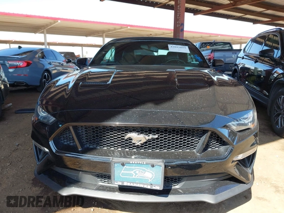 2019 Ford Mustang GT Premium z VIN 1FATP8FF7K5126175, wystawiony jako IAAI lot #42015019 z przebiegiem 91 335 mil mil oraz . Historia ofert i sprzedaży dostępna na DreamBid. Obrazek 12.