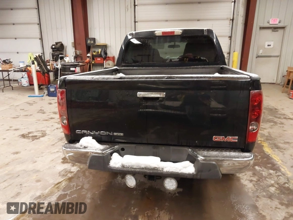 2009 GMC Canyon SLE1 with VIN 1GTDT13E698103718, listed as a IAAI auction lot 41581701 with 129,766 mi miles. Bid and sale history available at carsss.com. Image 16.