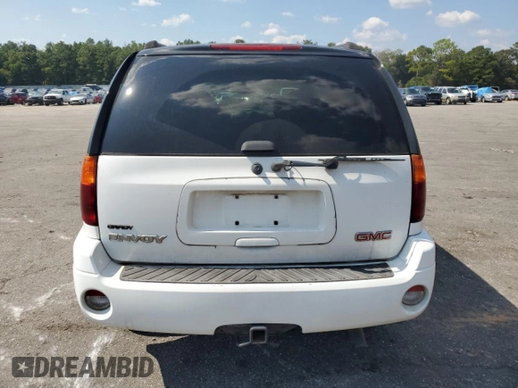 2005 GMC Envoy SLT with VIN 1GKDS13S852261763, listed as a Copart auction lot 75420254 with 182,559 mi miles and Salvage Title. Bid and sale history available at DreamBid. Image 6.