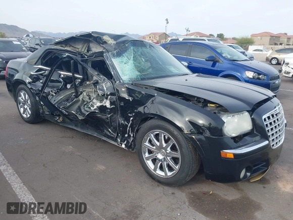2008 Chrysler 300 C Hemi with VIN 2C3KA63H18H335466, listed as a IAAI auction lot 41899381 with Not Provided miles and . Bid and sale history available at carsss.com. Image 1.