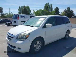 2005 Honda Odyssey EX-L with VIN 5FNRL38605B045246, listed as a IAAI auction lot 42183883 with 164,072 mi miles and . Bid and sale history available at carsss.com. Image 6.