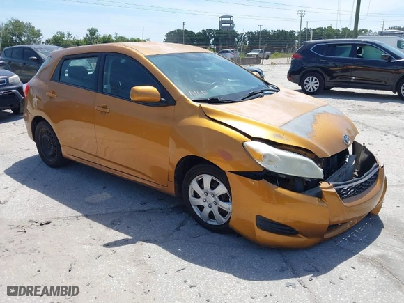 2009 Toyota Matrix S with VIN 2T1LE40E49C001740, listed as a IAAI auction lot 42088899 with 173,939 mi miles. Bid and sale history available at carsss.com. Image 1.