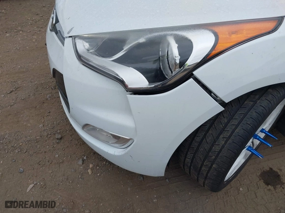 2016 Hyundai Veloster with VIN KMHTC6ADXGU273034, listed as a IAAI auction lot 40420771 with 206,694 mi miles. Bid and sale history available at carsss.com. Image 6.