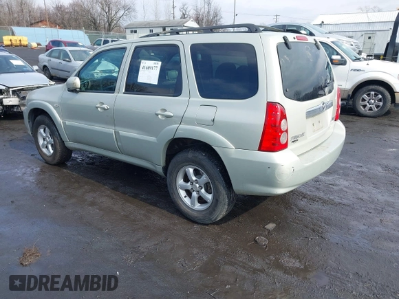 2006 Mazda Tribute S with VIN 4F2YZ04136KM15337, listed as a IAAI auction lot 41689177 with 153,720 mi miles and . Bid and sale history available at DreamBid. Image 3.