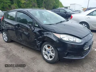 2014 Ford Fiesta SE z VIN 3FADP4EJ3EM205098, wystawiony jako IAAI lot #42371316 z przebiegiem 130 420 mil mil oraz . Historia ofert i sprzedaży dostępna na DreamBid. Obrazek 1.