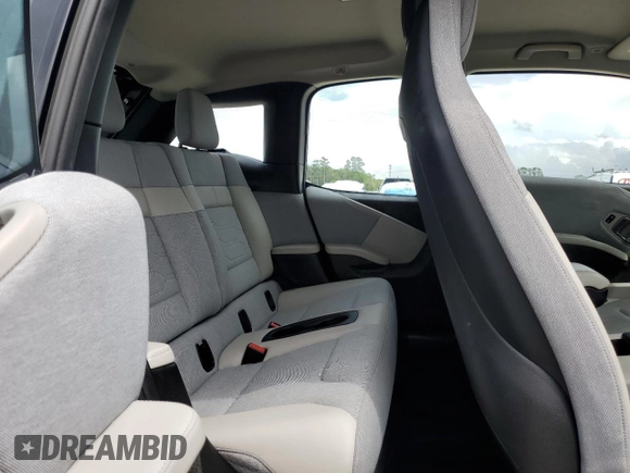 2015 BMW i3 z VIN WBY1Z2C57FV555583, wystawiony jako Copart lot #51128435 z przebiegiem 49 492 mil mil oraz Szkoda całkowita • Salvage title. Historia ofert i sprzedaży dostępna na DreamBid. Obrazek 11.