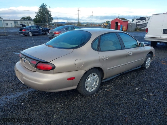 1999 Ford Taurus SE with VIN 1FAFP53U0XG209151, listed as a IAAI auction lot 41778371 with 107,262 mi miles. Bid and sale history available at carsss.com. Image 4.