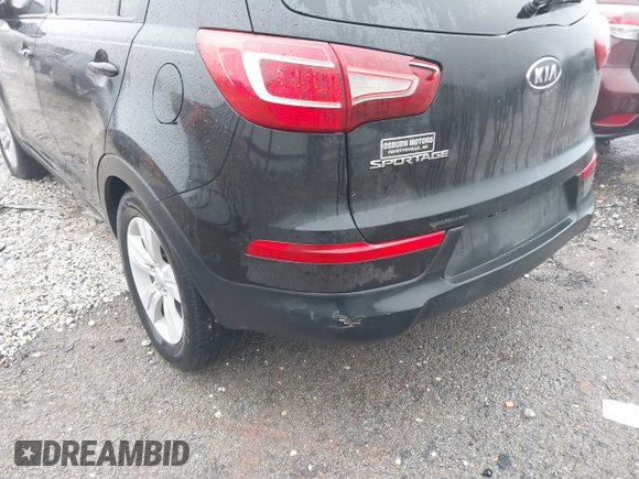 2011 Kia Sportage LX with VIN KNDPB3A25B7027733, listed as a IAAI auction lot 38570270 with 186,271 mi miles and . Bid and sale history available at carsss.com. Image 6.