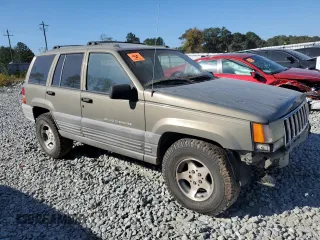 1998 Jeep Grand Cherokee Laredo with VIN 1J4FX58S7WC179728, listed as a Copart auction lot 77372224 with 0 mi miles and Clean Title. Bid and sale history available at carsss.com. Image 4.