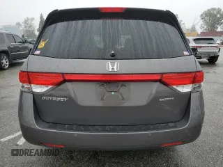 2016 Honda Odyssey Touring Elite with VIN 5FNRL5H97GB090094, listed as a Copart auction lot 50545285 with 158,334 mi miles and Salvage Title. Bid and sale history available at DreamBid. Image 6.