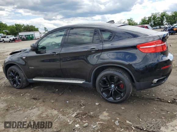 2012 BMW X6 50i z VIN 5UXFG8C51CLZ97393, wystawiony jako Copart lot #58407285 z przebiegiem 128 040 mil mil oraz Szkoda całkowita • Salvage title. Historia ofert i sprzedaży dostępna na DreamBid. Obrazek 2.