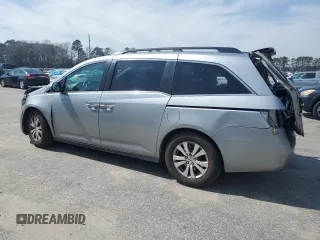 2016 Honda Odyssey SE with VIN 5FNRL5H36GB144433, listed as a Copart auction lot 48898755 with 192,442 mi miles and Salvage Title. Bid and sale history available at DreamBid. Image 2.