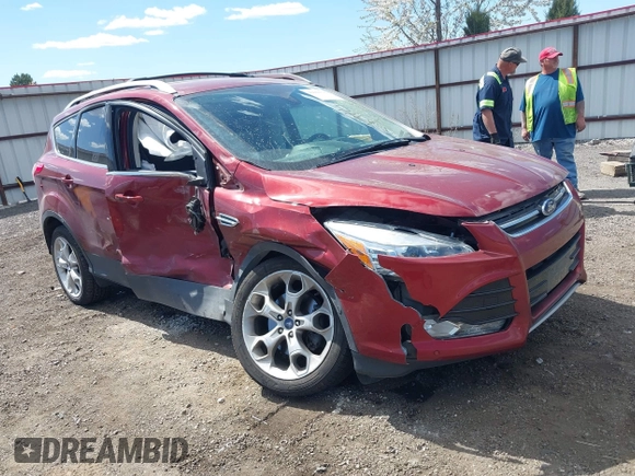 2014 Ford Escape Titanium with VIN 1FMCU9J91EUB53601, listed as a IAAI auction lot 42066465 with 105,933 mi miles and . Bid and sale history available at DreamBid. Image 1.