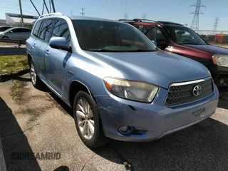2009 Toyota Highlander Hybrid Limited with VIN JTEEW44A392028371, listed as a IAAI auction lot 41826565 with 210,309 mi miles. Bid and sale history available at carsss.com. Image 1.