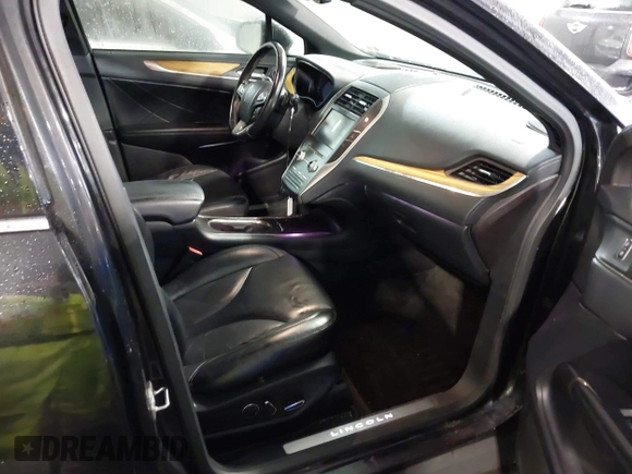 2015 Lincoln MKC with VIN 5LMCJ2A98FUJ17855, listed as a IAAI auction lot 41433416 with 113,070 mi miles. Bid and sale history available at carsss.com. Image 5.
