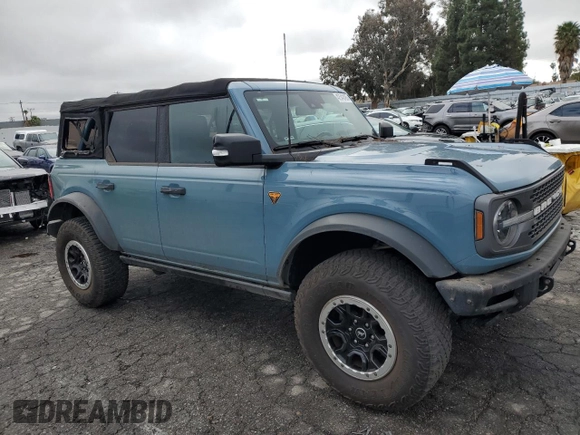 2021 Ford Bronco with VIN 1FMEE5DP4MLA90474, listed as a Copart auction lot 42542495 with 26,674 mi miles and Salvage Title. Bid and sale history available at DreamBid. Image 4.