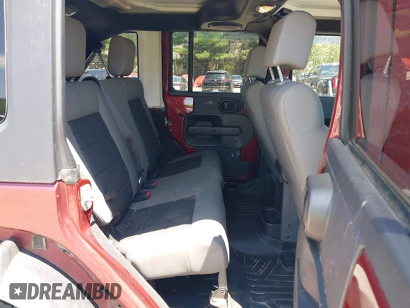 2008 Jeep Wrangler Unlimited X with VIN 1J4GA39178L646701, listed as a IAAI auction lot 42507361 with 171,153 mi miles and . Bid and sale history available at DreamBid. Image 8.