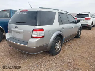 2008 Ford Taurus X SEL with VIN 1FMDK05W08GA34981, listed as a IAAI auction lot 41375371 with 233,889 mi miles. Bid and sale history available at carsss.com. Image 4.