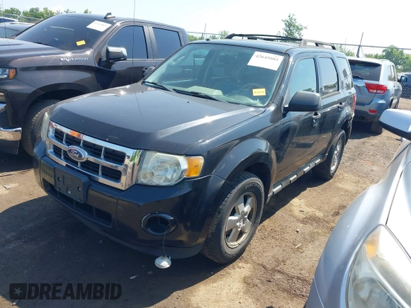 2011 Ford Escape XLT z VIN 1FMCU9DG6BKB21924, wystawiony jako IAAI lot #42645085 z przebiegiem 305 186 mil mil oraz . Historia ofert i sprzedaży dostępna na DreamBid. Obrazek 2.