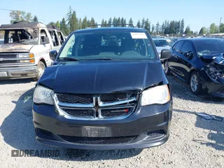 2012 Dodge Grand Caravan SXT with VIN 2C4RDGCG2CR319651, listed as a IAAI auction lot 42097594 with 155,521 mi miles and . Bid and sale history available at DreamBid. Image 12.